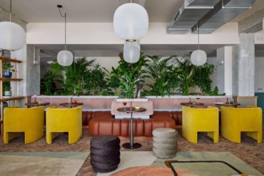 WunderLocke Transforms Muniche Office Into A Colourful, Biophilic Hotel