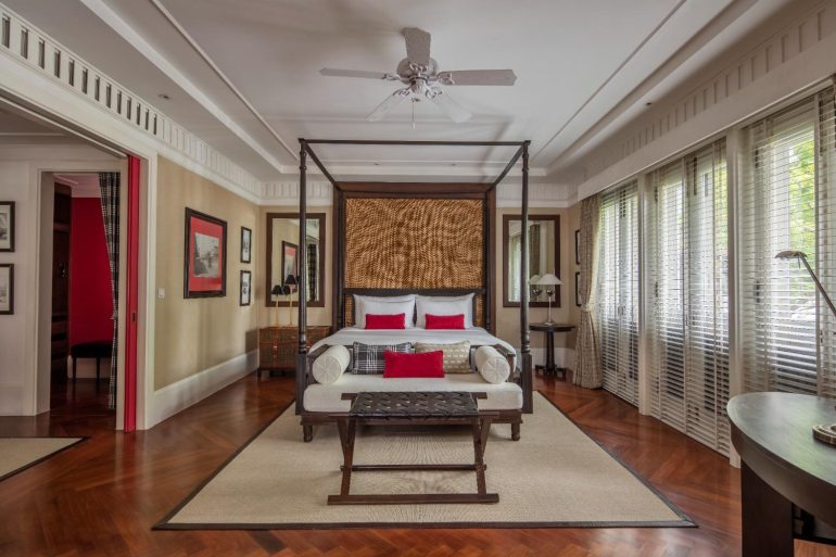 The four-poster bed in the William Bain Terrace and Louis Leonowens Pool suites